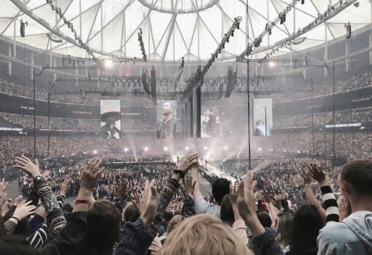 Full arena crowd energy during a live event