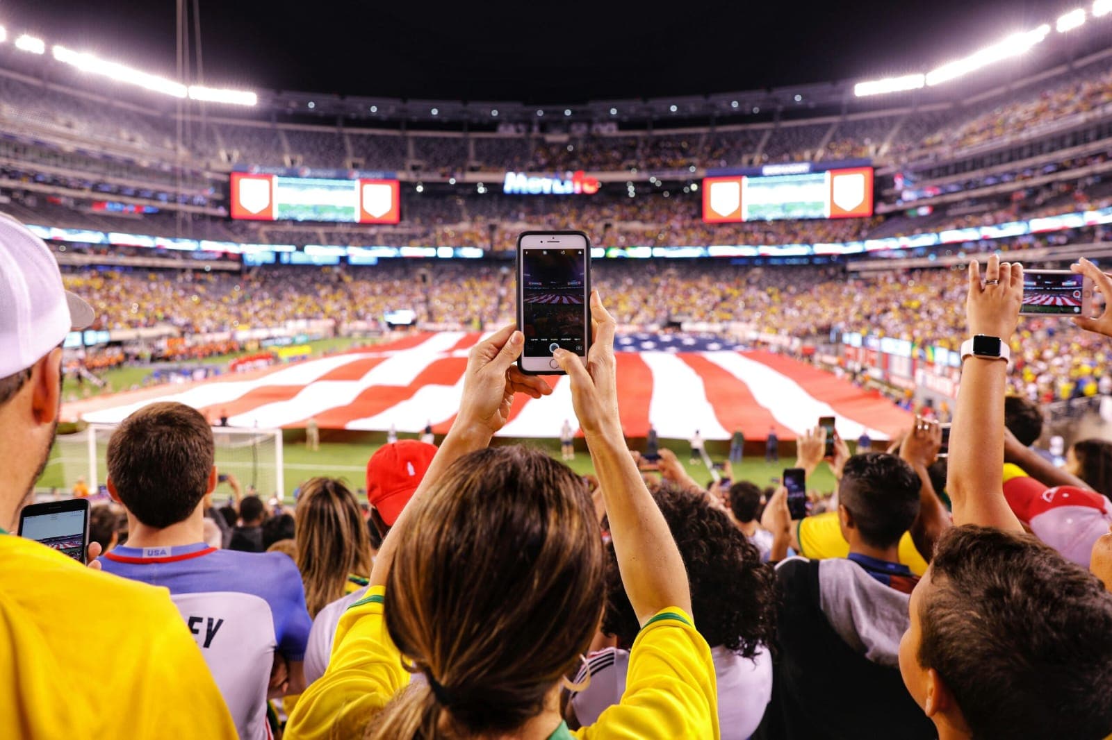 Fans engaged in the crowd during a live match